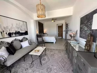 Casita 6 interior living area with sofa and coastal decor