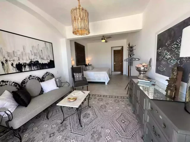 Casita 6 interior living area with sofa and coastal decor