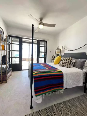 casita-7-colorful-ocean-view-bedroom Casita 7 bedroom with colorful woven blanket and ocean view near Todos Santos