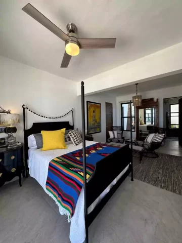 casita-7-four-poster-ocean-view-bedroom Casita 7 four-poster bedroom with colorful woven blanket and ocean view near Todos Santos